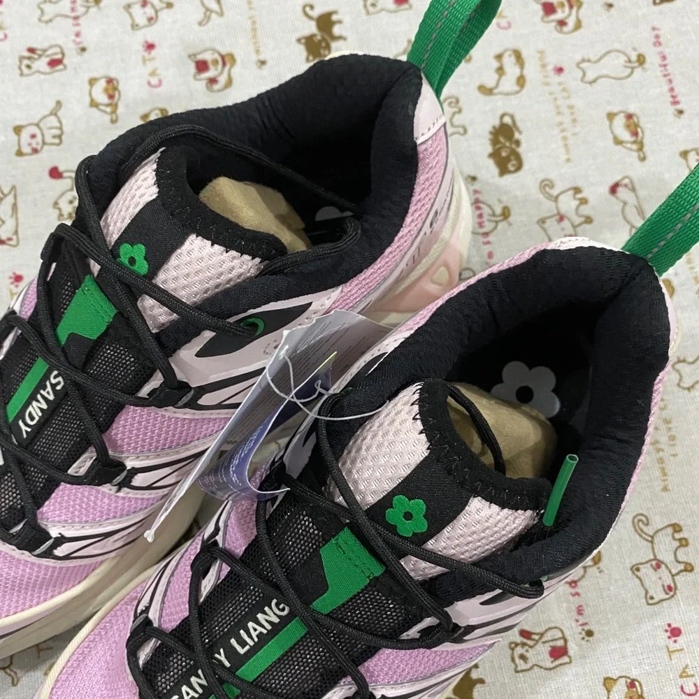 Salomon Women’s Pink and Green Trail Sneakers